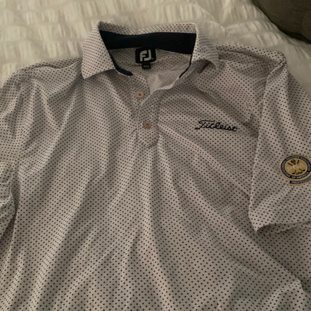White and black footjoy/titleist shirt w/ PGA patch